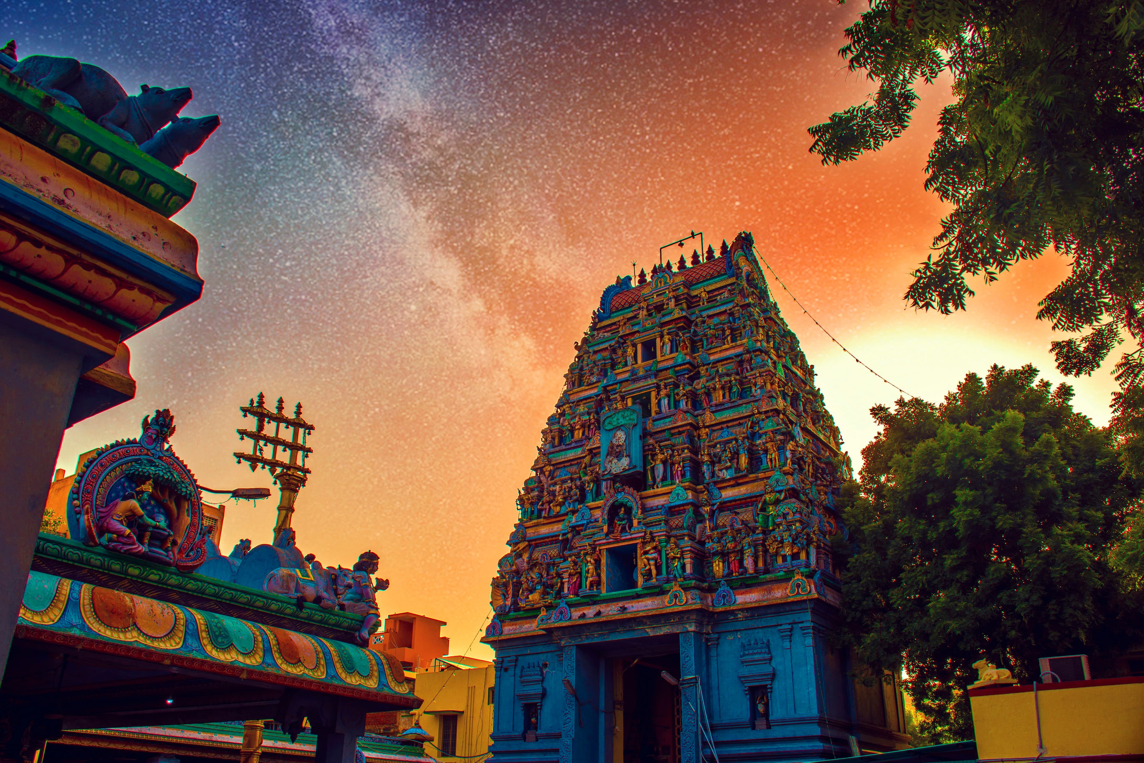 Colourful South Indian temple tower at dusk